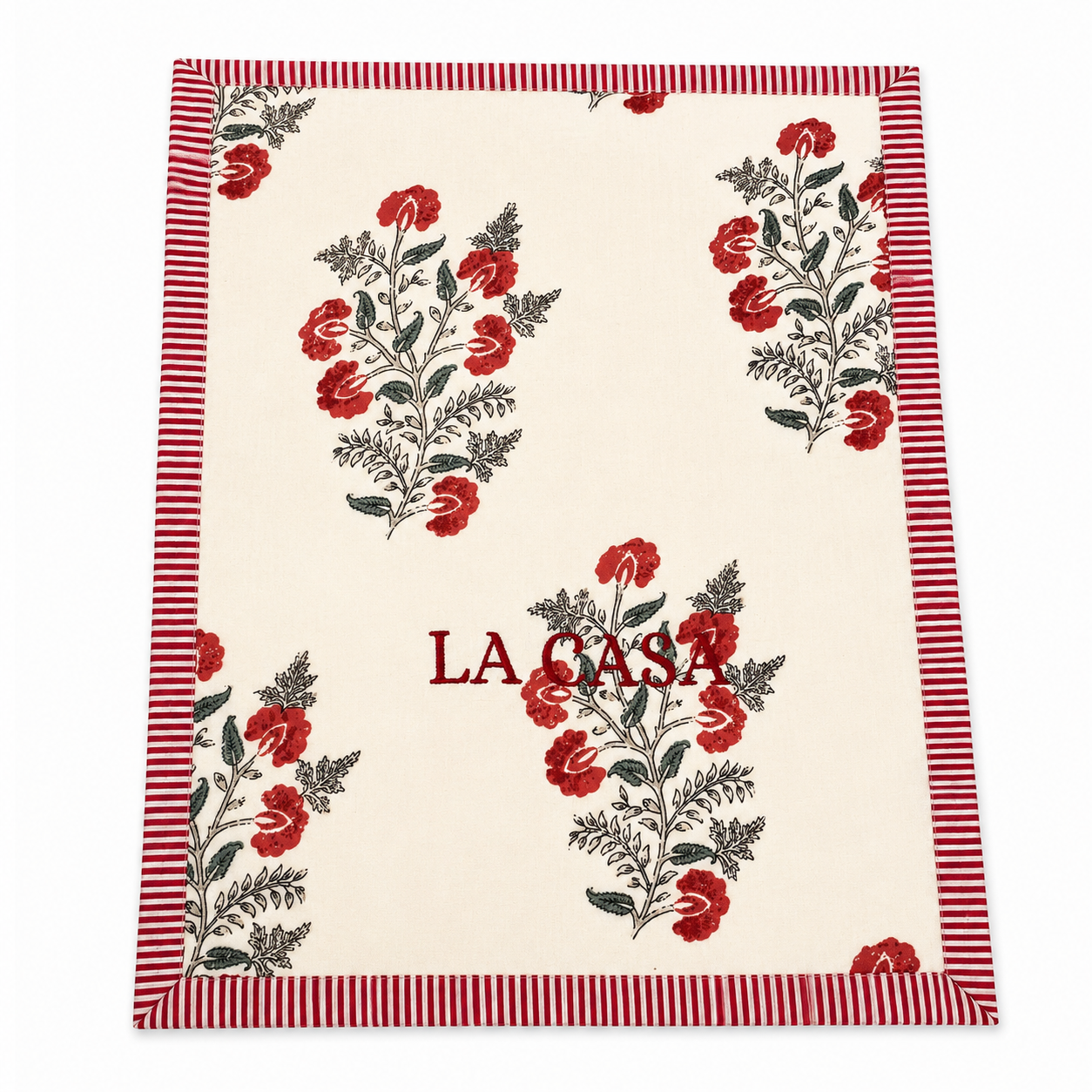 Close up of Inez La Casa cream floral block-print guest towels, red LA CASA embroidery, red striped trim, terry lined, set of two