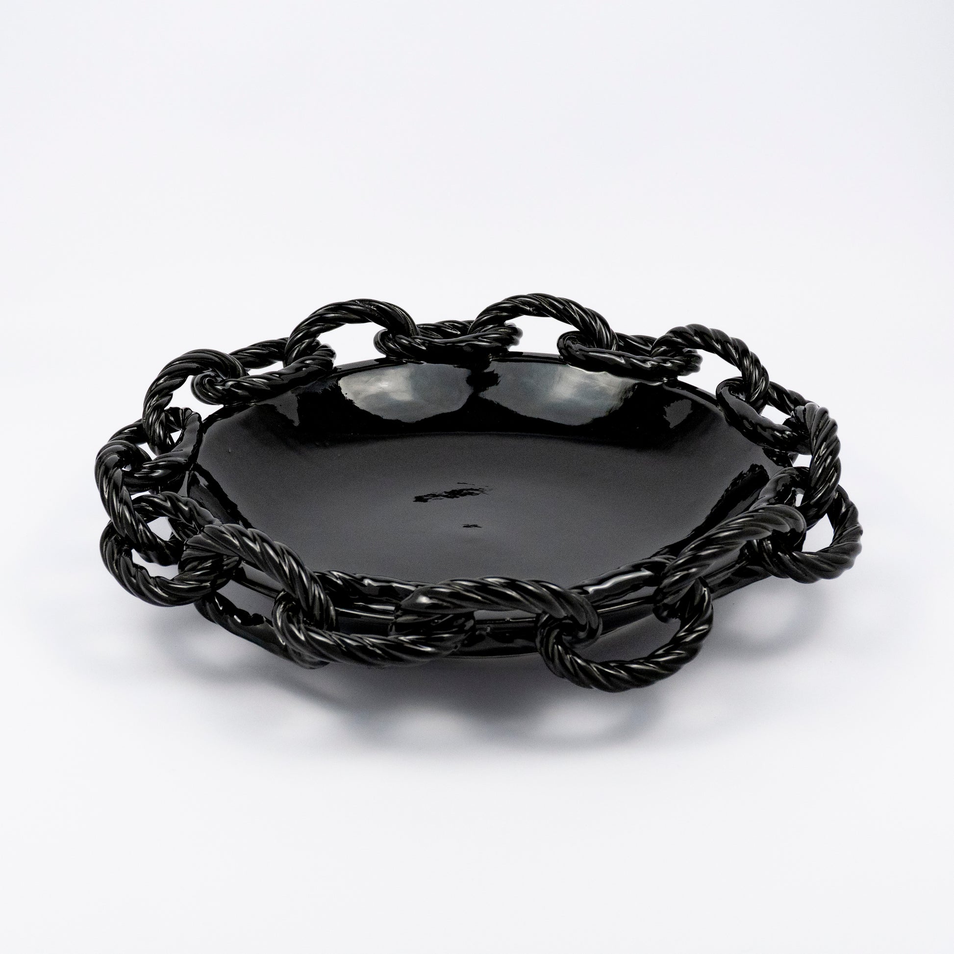 Rassilo ceramic round platter, glossy black glaze, openwork twisted rope chain-link rim
