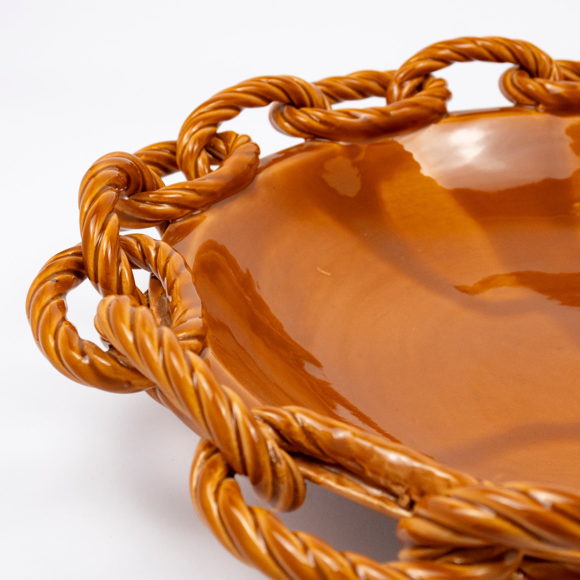 Rassilo ceramic round platter, glossy orange brown glaze, openwork twisted rope chain-link rim