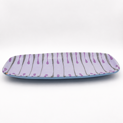 Side view of Beni oven-safe ceramic serving platter showing rectangular shape and light blue base glaze