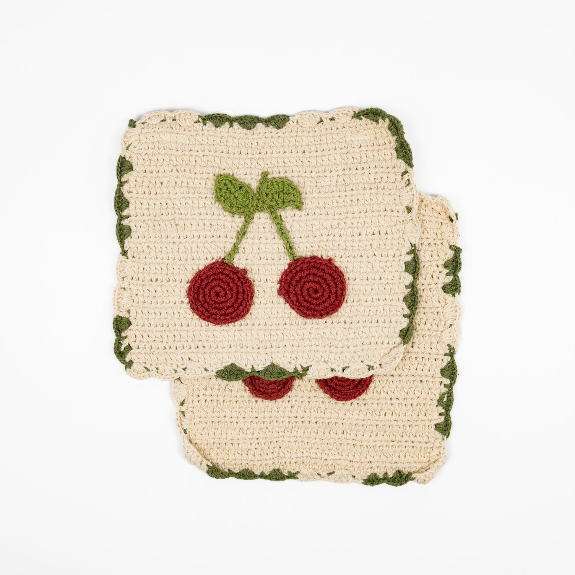 Cerise cream crochet cotton pot holders, red cherry motif, scalloped green trim, set of two