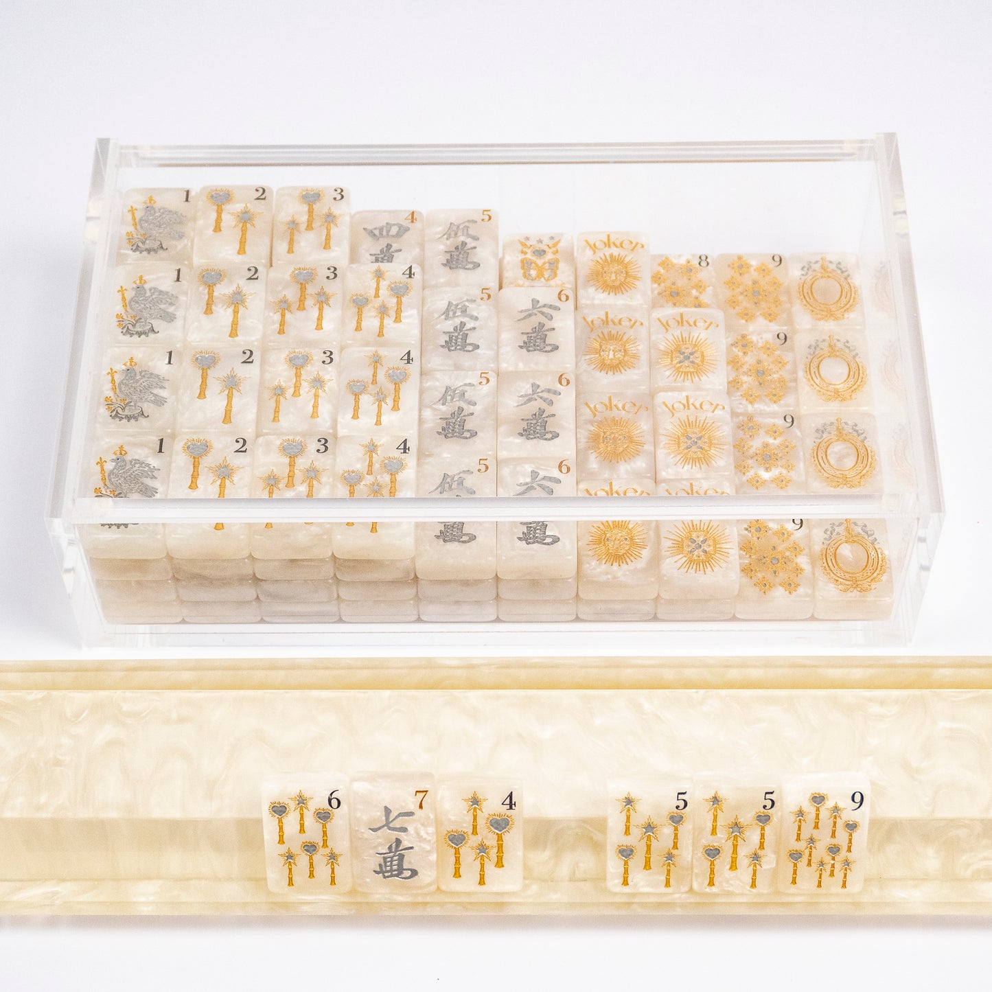 Club Mah Jenn D'or mahjong set, silver and gold metallic on white pearl acrylic tiles, clear acrylic box, mother-of-pearl racks