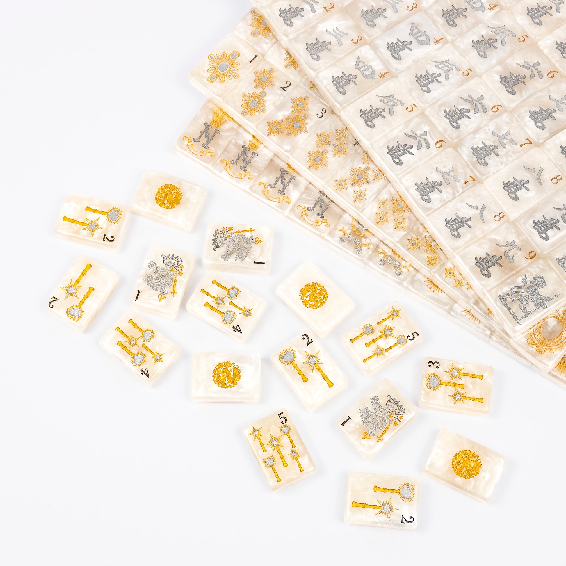 Club Mah Jenn D'or mahjong set, silver and gold metallic on white pearl acrylic tiles, clear acrylic box, mother-of-pearl racks