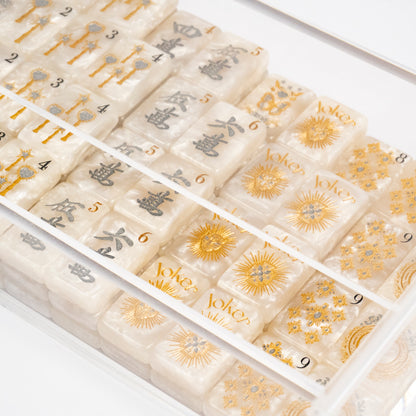 Club Mah Jenn D'or mahjong set, silver and gold metallic on white pearl acrylic tiles, clear acrylic box, mother-of-pearl racks