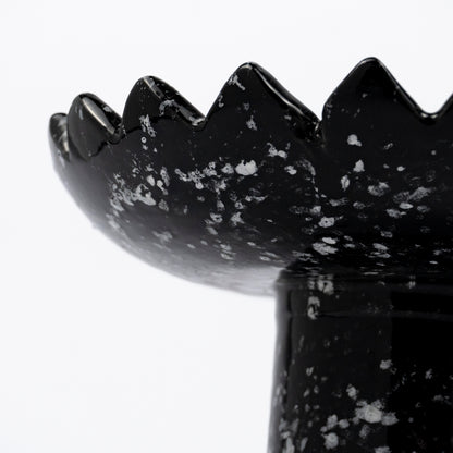 Floree ceramic pedestal bowl, black with white speckle glaze, sawtooth zigzag rim, footed base