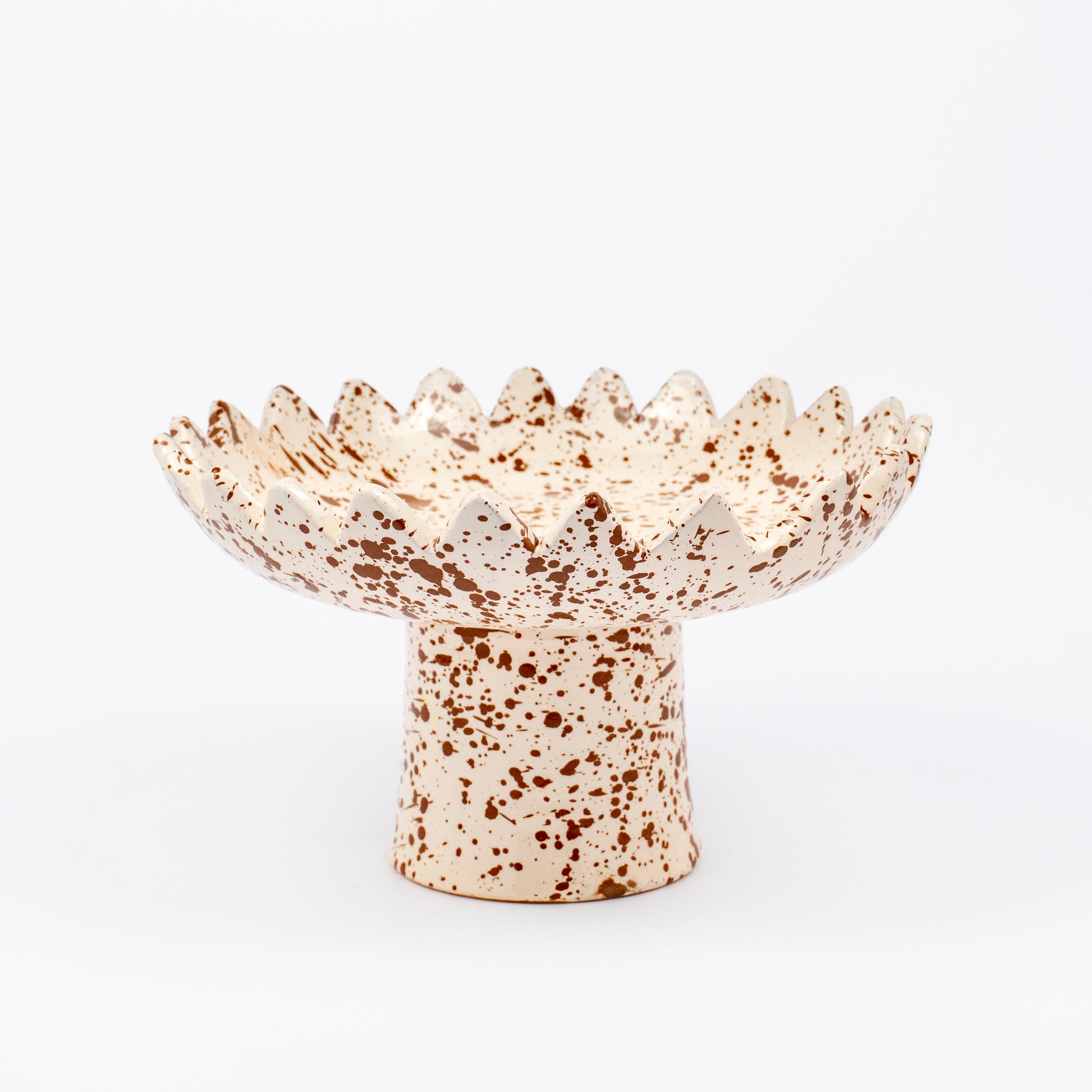 loree ceramic pedestal bowl, cream with rich brown speckle glaze, sawtooth zigzag rim, footed base