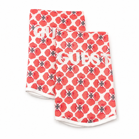Geo Guest red poppy block-print hand towels, white GUEST embroidery, terry lined, set of two