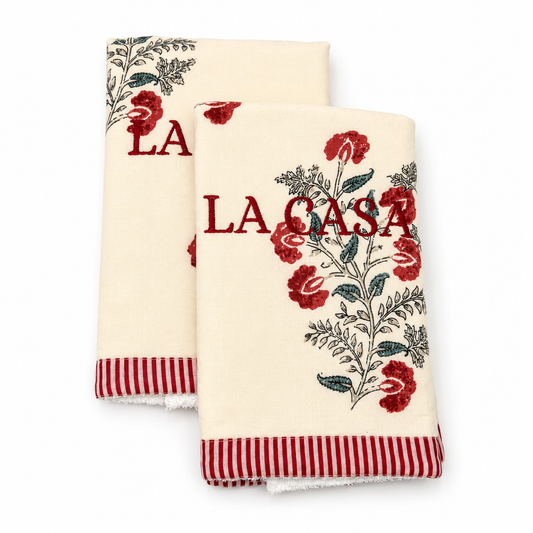 Inez La Casa cream floral block-print guest towels, red LA CASA embroidery, red striped trim, terry lined, set of two