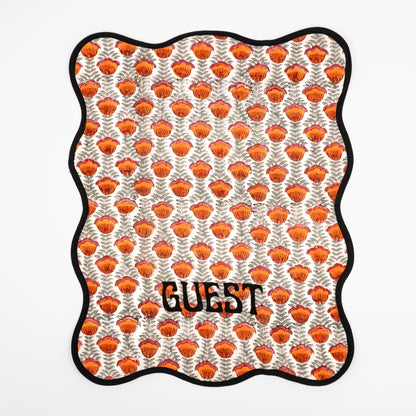 Magnolia cream floral block-print guest towels, orange poppies, black GUEST embroidery, set of two