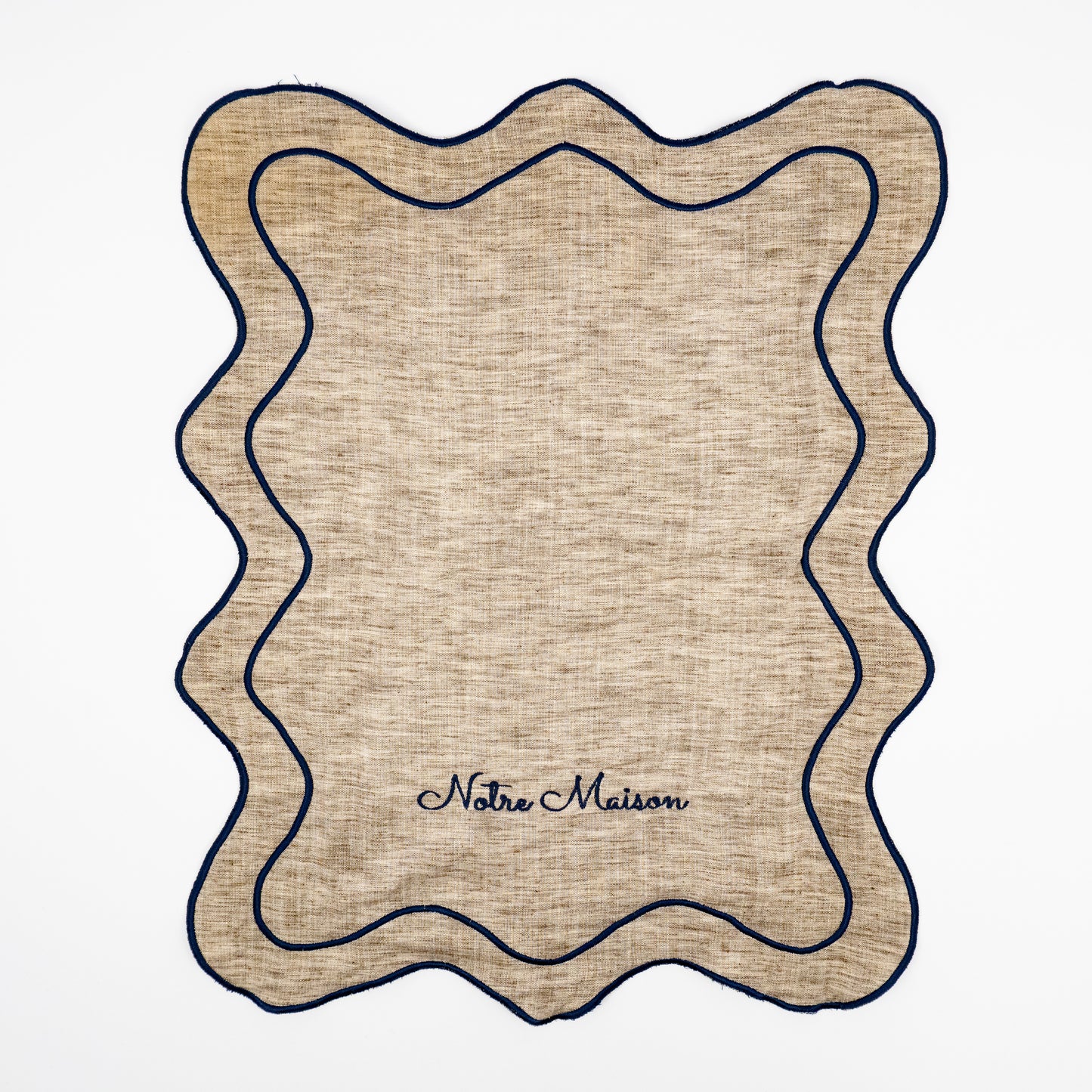 Nino Notre Maison natural linen guest towels, navy script embroidery, scalloped navy wave trim, set of two