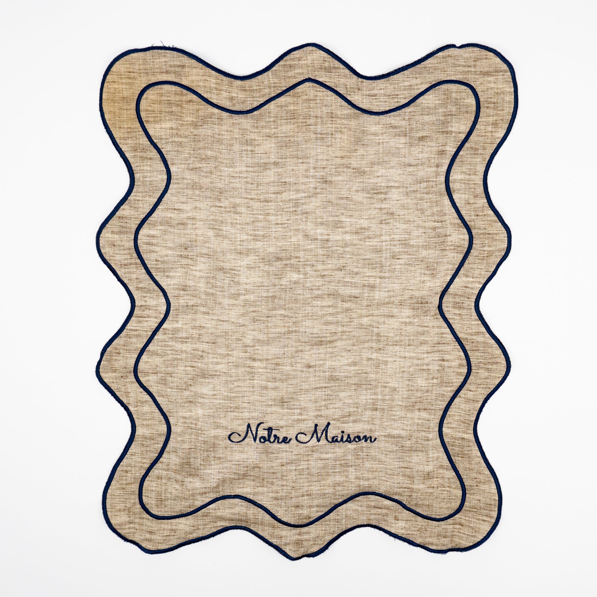 Nino Notre Maison natural linen guest towels, navy script embroidery, scalloped navy wave trim, set of two
