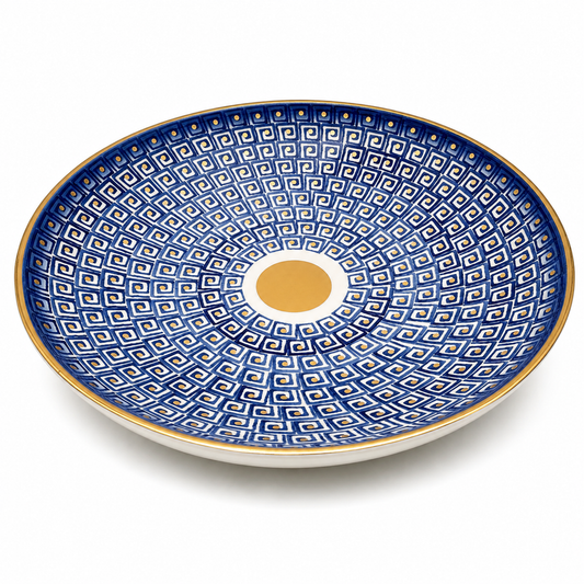 Noemi Maiolica ceramic serving bowl with navy blue geometric pattern, gold rim and gold center medallion