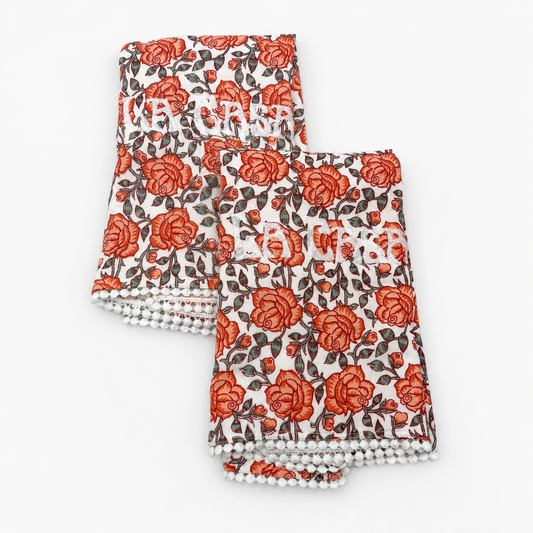 Orly La Casa coral rose floral guest towels, white LA CASA embroidery, pom-pom trim, set of two