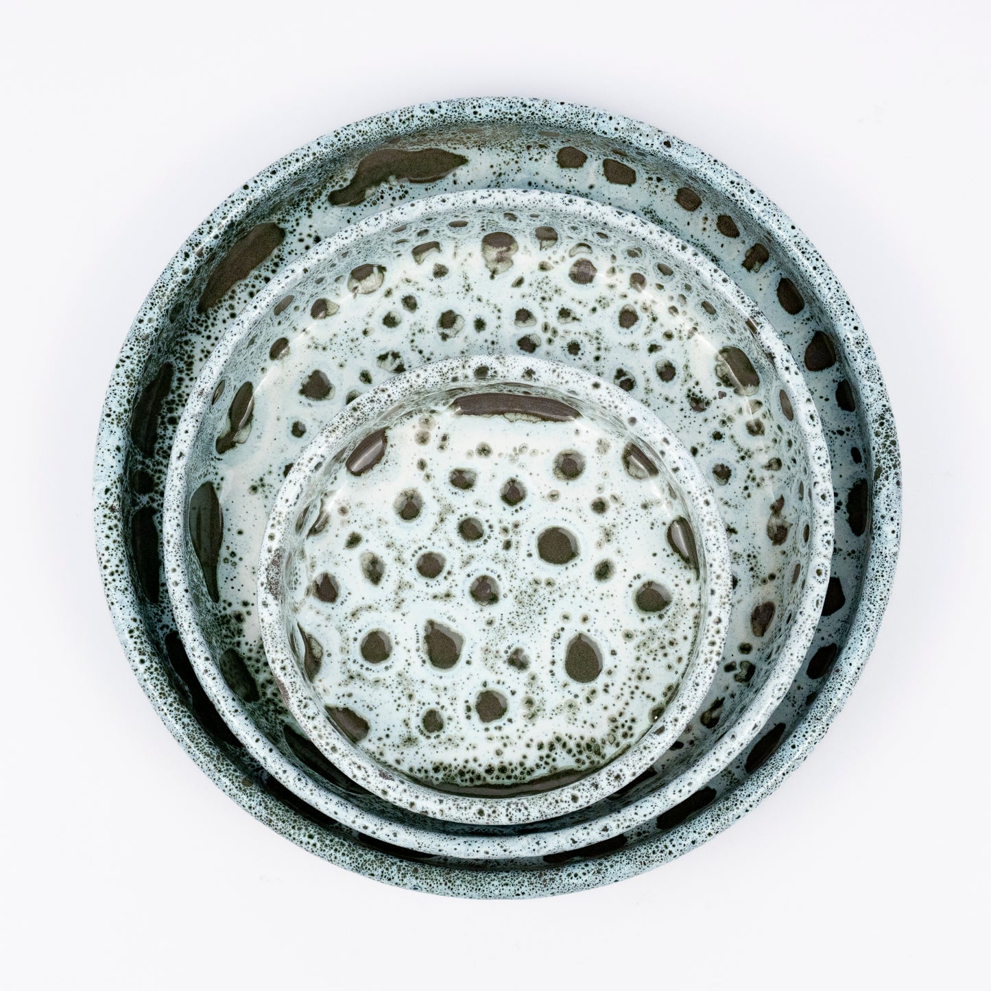 Stan ceramic bowls set of three, nesting bowls, blue and white reactive lava glaze, speckled finish