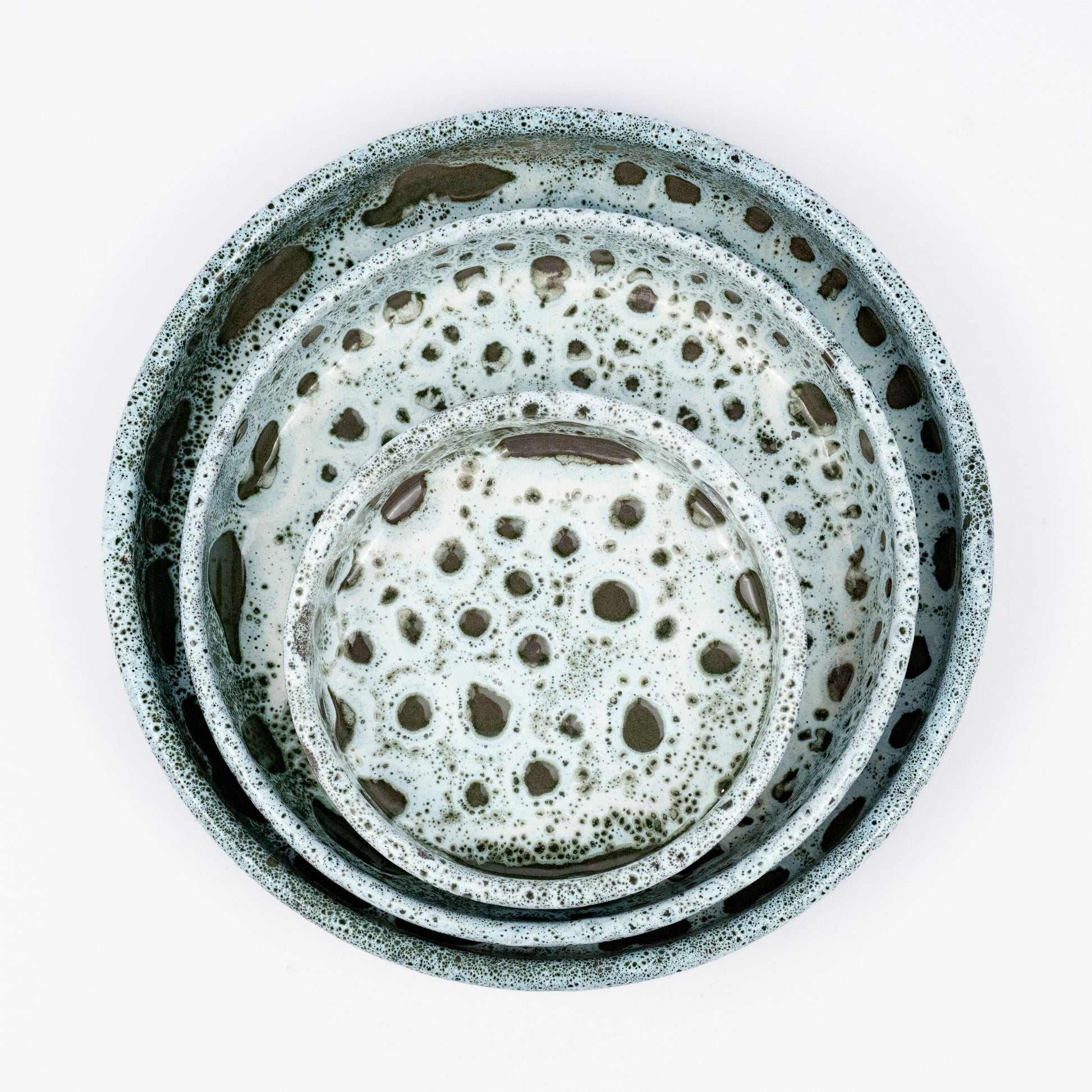 Stan ceramic bowls set of three, nesting bowls, blue and white reactive lava glaze, speckled finish