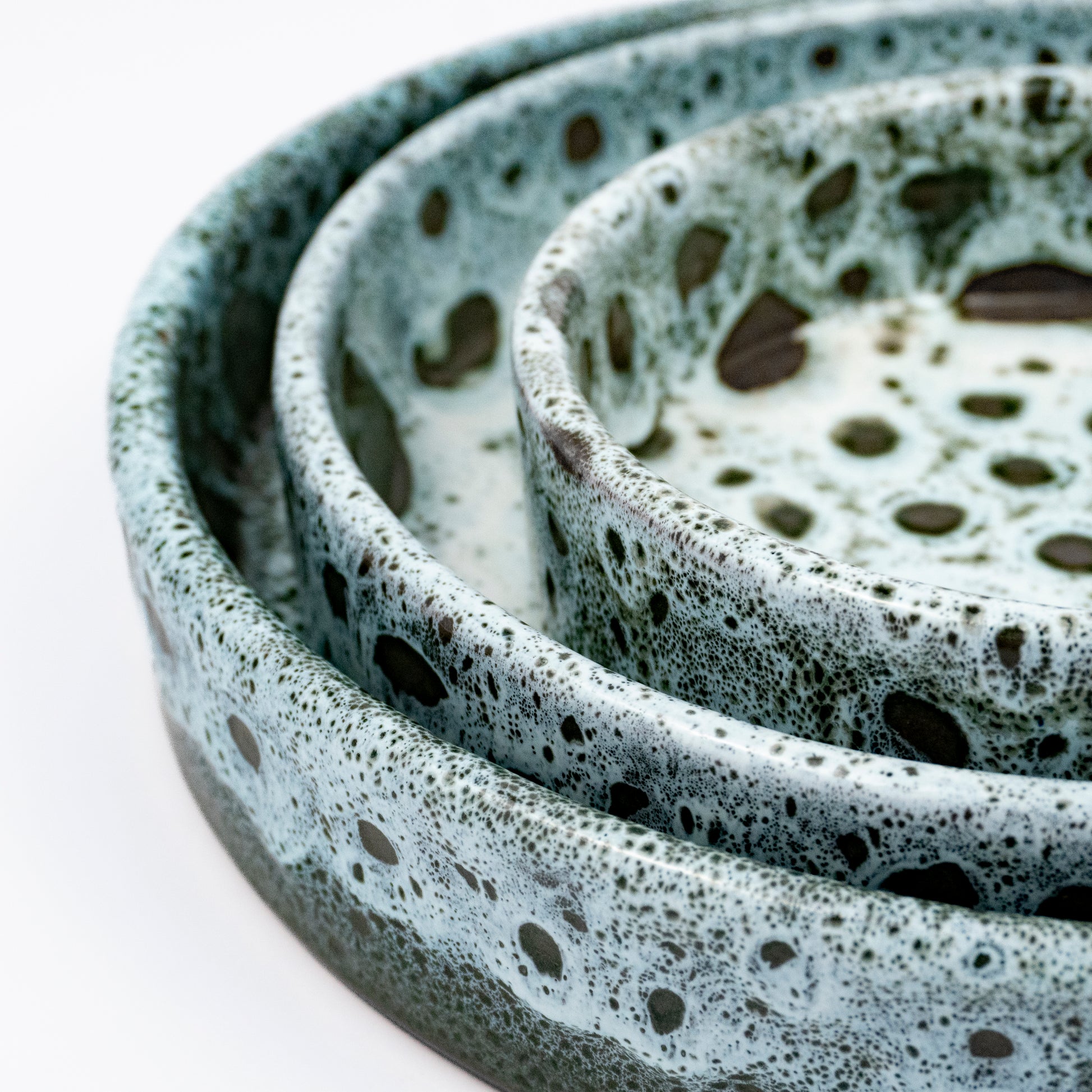 Stan ceramic bowls set of three, nesting bowls, blue and white reactive lava glaze, speckled finish