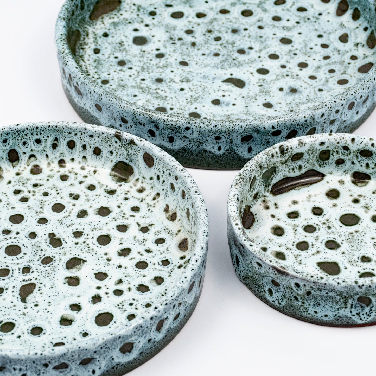 Stan ceramic bowls set of three, nesting bowls, blue and white reactive lava glaze, speckled finish