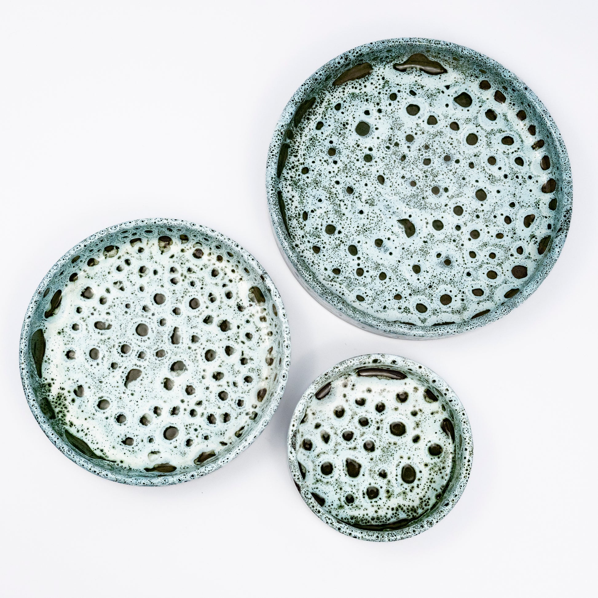 Stan ceramic bowls set of three, nesting bowls, blue and white reactive lava glaze, speckled finish