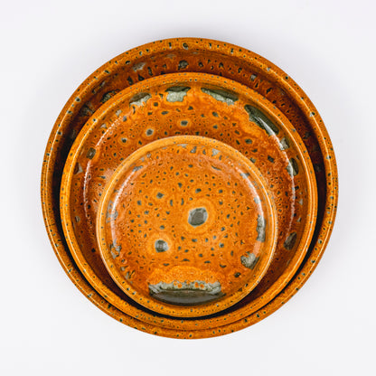 Stan ceramic bowls set of three, nesting bowls, amber and green reactive lava glaze, speckled finish