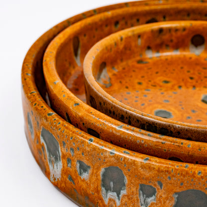 Stan ceramic bowls set of three, nesting bowls, amber and green reactive lava glaze, speckled finish
