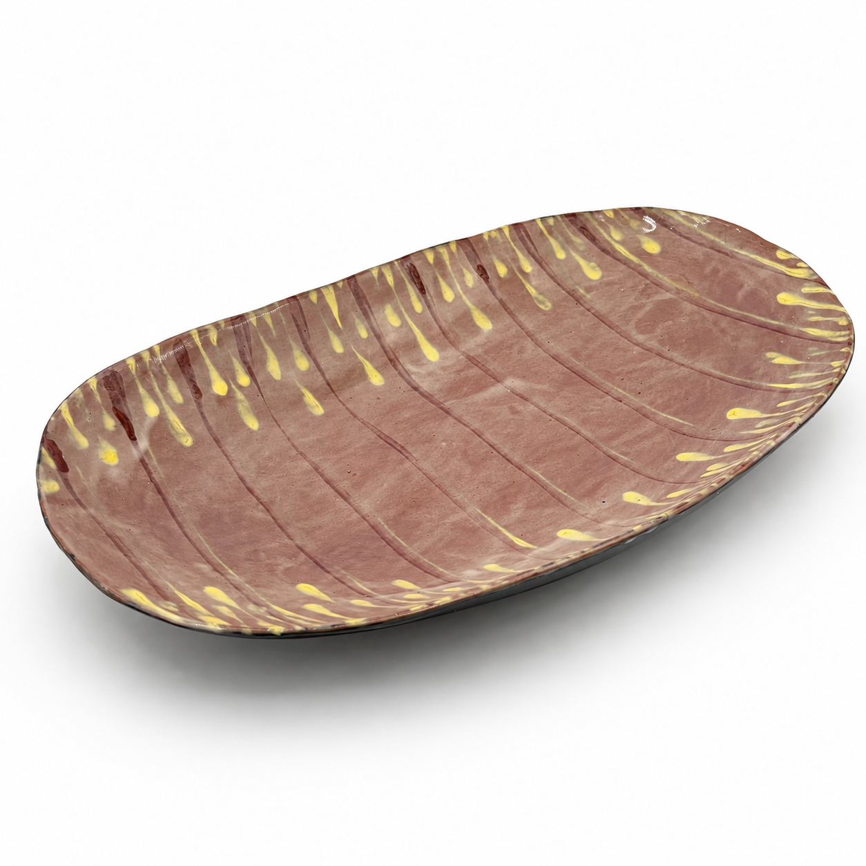 Taro oven-safe ceramic serving bowl, oval shape in mauve with hand-painted yellow and burgundy drip pattern