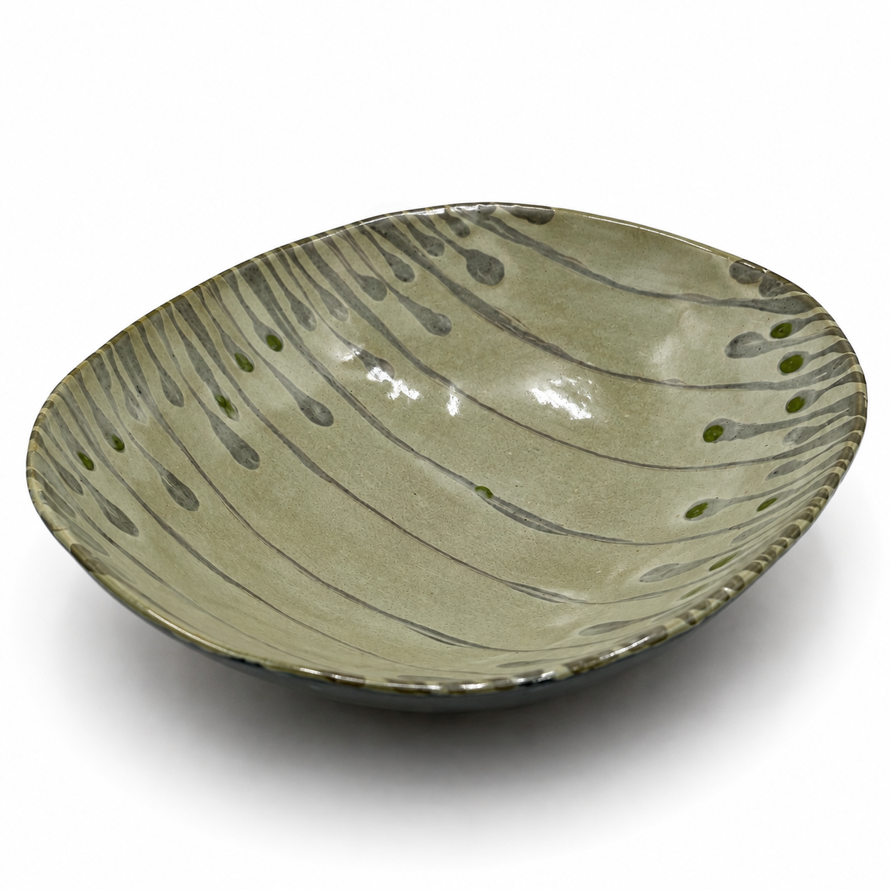 Varde oven-safe ceramic serving bowl with organic gray drip glaze pattern and green accent dots